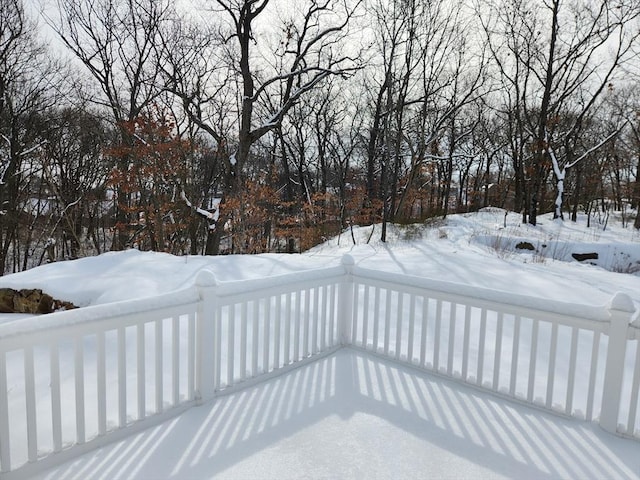 view of snow covered deck