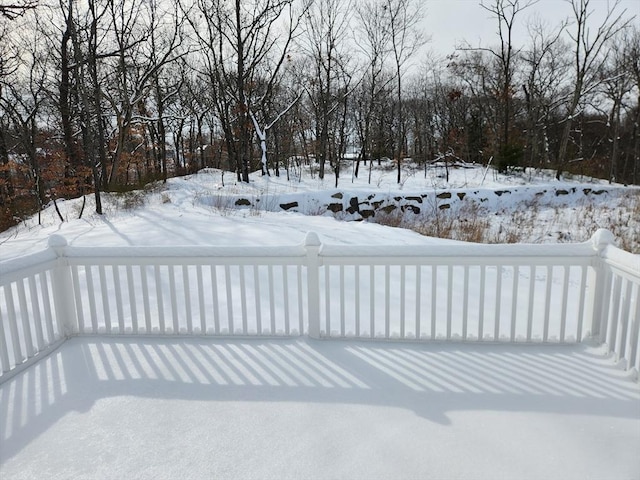 view of snow covered deck