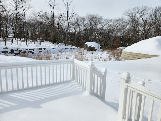 view of yard layered in snow