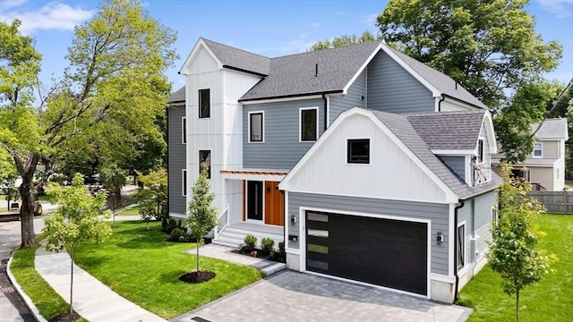 66 Upham St, Newton, MA 02465 - modern farmhouse featuring roof with shingles, board and batten siding, a garage, and driveway