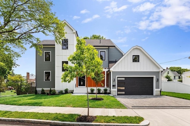 66 Upham St, Newton, MA 02465 - modern inspired farmhouse with board and batten siding, decorative driveway, entry steps, and a shingled roof