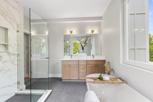 66 Upham St, Newton, MA 02465 - bathroom featuring a soaking tub, double vanity, tile patterned floors, a marble finish shower, and baseboards