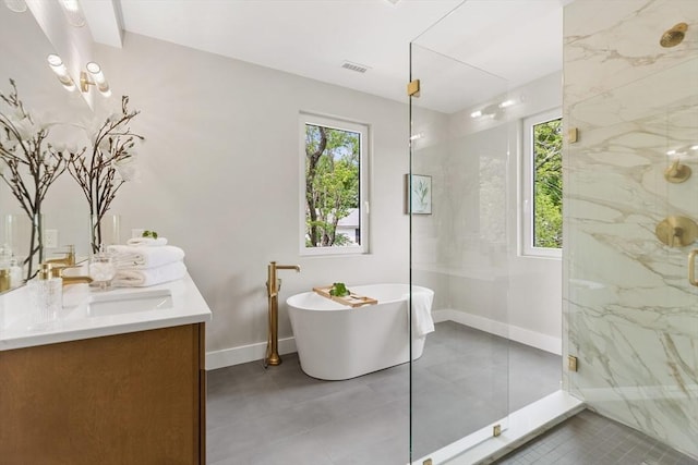 66 Upham St, Newton, MA 02465 - full bath featuring healthy amount of natural light, a marble finish shower, double vanity, and baseboards