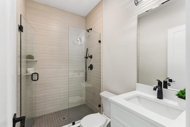 66 Upham St, Newton, MA 02465 - bathroom with vanity, a shower stall, toilet, and tile patterned flooring