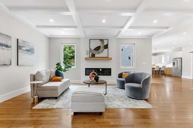 66 Upham St, Newton, MA 02465 - living area with recessed lighting, baseboards, coffered ceiling, a fireplace, and beamed ceiling