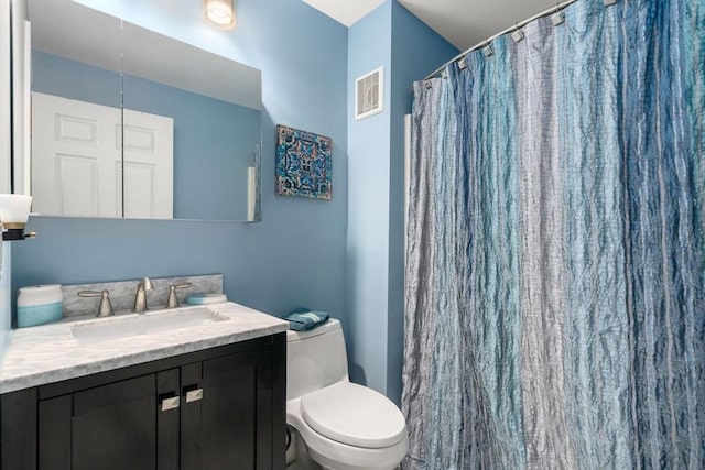17 Angela Ln Unit 17, Watertown, MA 02472 - bathroom featuring vanity, toilet, and a shower with shower curtain
