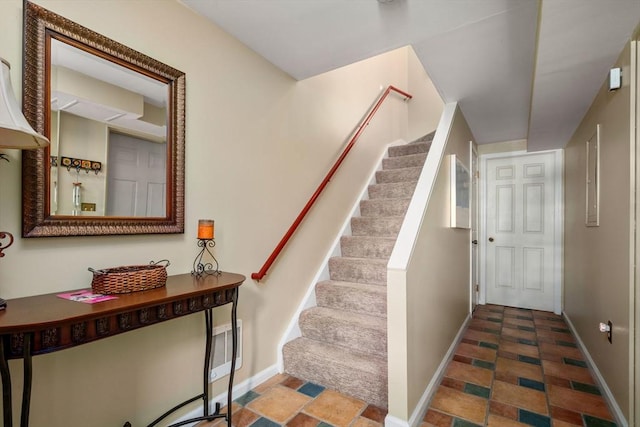 17 Angela Ln Unit 17, Watertown, MA 02472 - staircase featuring baseboards