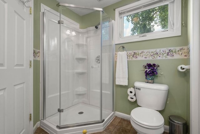 55 W 3rd St Unit 3, Lowell, MA 01850 - bathroom with a shower stall, toilet, baseboards, and tile patterned flooring