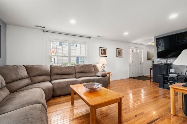 55 W 3rd St Unit 3, Lowell, MA 01850 - living room with light wood-type flooring, recessed lighting, and baseboards