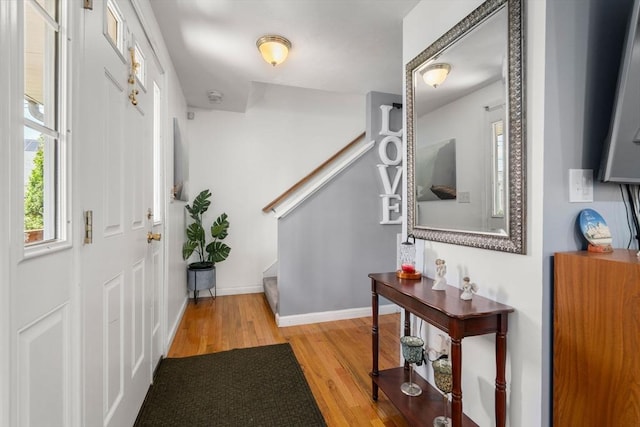 55 W 3rd St Unit 3, Lowell, MA 01850 - foyer entrance featuring stairway, wood finished floors, and baseboards