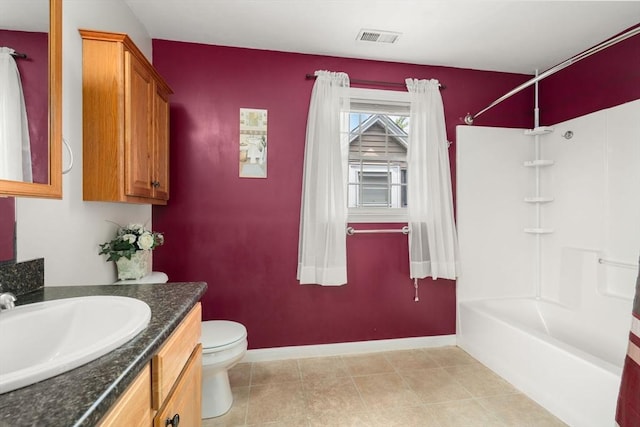 55 W 3rd St Unit 3, Lowell, MA 01850 - full bath with vanity, shower / bath combination, toilet, baseboards, and tile patterned flooring