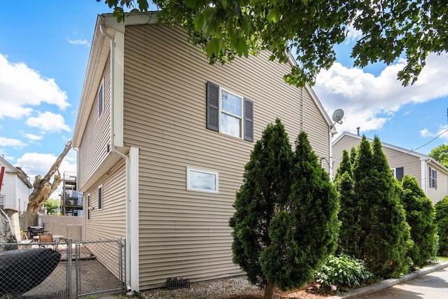 55 W 3rd St Unit 3, Lowell, MA 01850 - view of property exterior featuring a gate