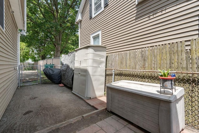55 W 3rd St Unit 3, Lowell, MA 01850 - view of patio with grilling area and a gate