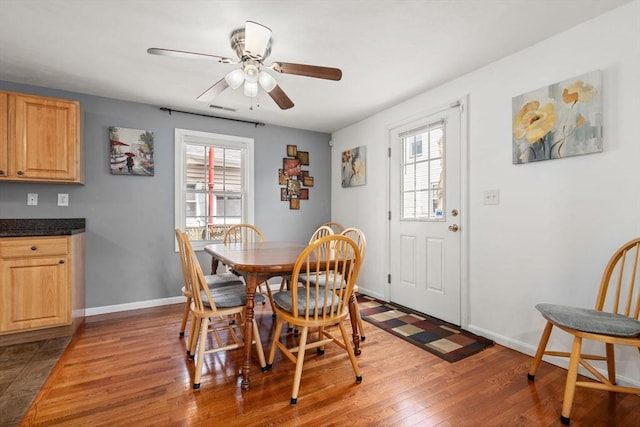 55 W 3rd St Unit 3, Lowell, MA 01850 - dining area with light wood-style flooring, baseboards, and a ceiling fan
