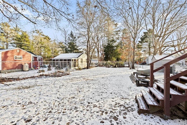 view of yard covered in snow