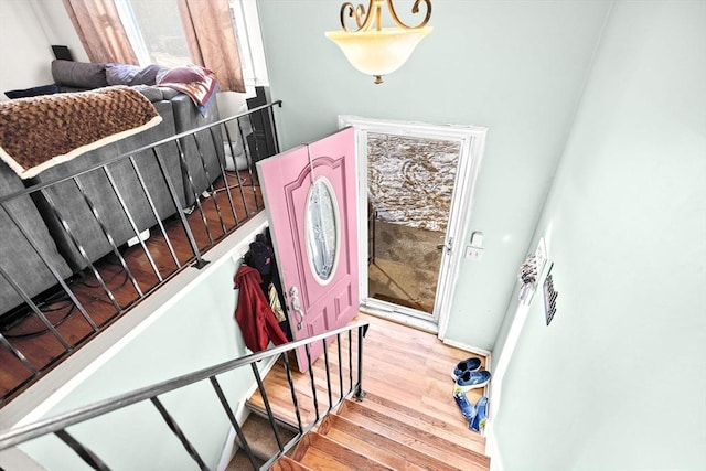 stairway featuring hardwood / wood-style flooring