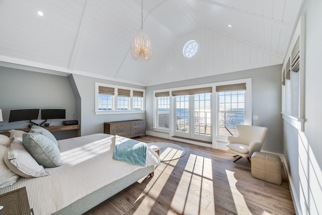 bedroom with vaulted ceiling with beams, wood-type flooring, and wood ceiling