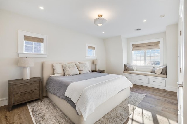 bedroom featuring light hardwood / wood-style floors