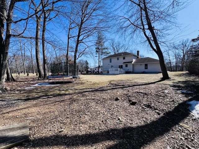 view of yard featuring a trampoline