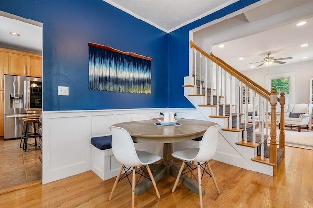 37 Devereux St, Marblehead, MA 01945 - dining space featuring stairway, light wood-style floors, recessed lighting, ceiling fan, and a wainscoted wall