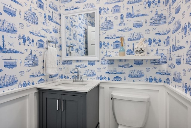 37 Devereux St, Marblehead, MA 01945 - bathroom with wallpapered walls, a wainscoted wall, vanity, and a decorative wall