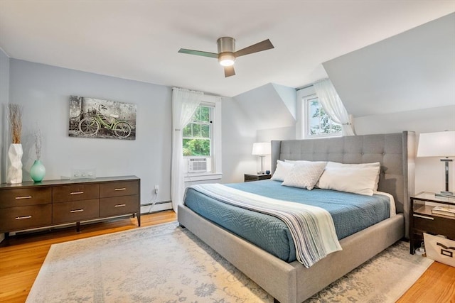 37 Devereux St, Marblehead, MA 01945 - bedroom with multiple windows, light wood-type flooring, cooling unit, a ceiling fan, and lofted ceiling