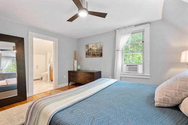 37 Devereux St, Marblehead, MA 01945 - bedroom featuring cooling unit, light wood-style floors, ensuite bath, a ceiling fan, and lofted ceiling