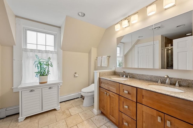 37 Devereux St, Marblehead, MA 01945 - full bath with a baseboard radiator, double vanity, and an enclosed shower