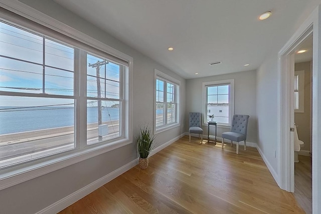 1091 Winthrop Ave, Revere, MA 02151 - living area featuring light wood-type flooring, recessed lighting, and a water view