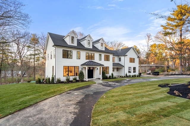 view of front of home featuring a front yard