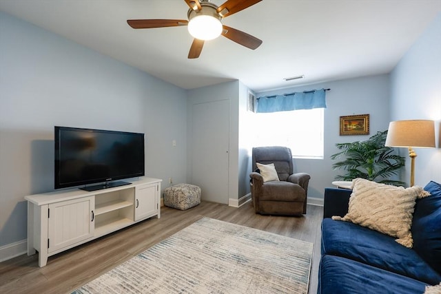 211 Central St Unit A305, Norwood, MA 02062 - living room featuring light wood-type flooring and ceiling fan