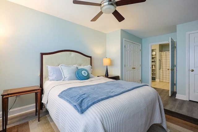 211 Central St Unit A305, Norwood, MA 02062 - bedroom with wood finished floors, a ceiling fan, and connected bathroom
