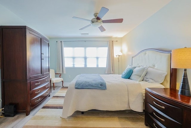 211 Central St Unit A305, Norwood, MA 02062 - bedroom with light wood-style flooring and ceiling fan