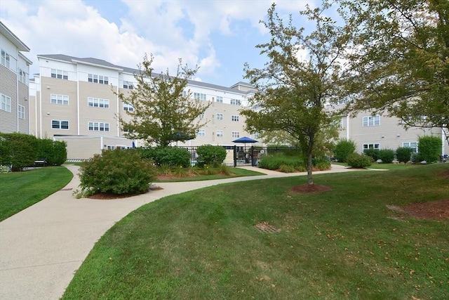 211 Central St Unit A305, Norwood, MA 02062 - surrounding community featuring a lawn