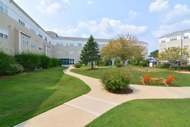 211 Central St Unit A305, Norwood, MA 02062 - surrounding community featuring a yard