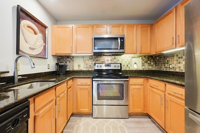 211 Central St Unit A305, Norwood, MA 02062 - kitchen with stainless steel appliances, dark stone countertops, and tasteful backsplash