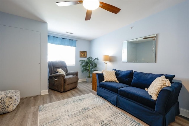 211 Central St Unit A305, Norwood, MA 02062 - living area featuring wood finished floors and a ceiling fan