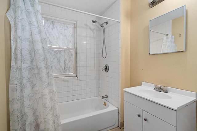 bathroom with vanity and shower / bath combination with curtain