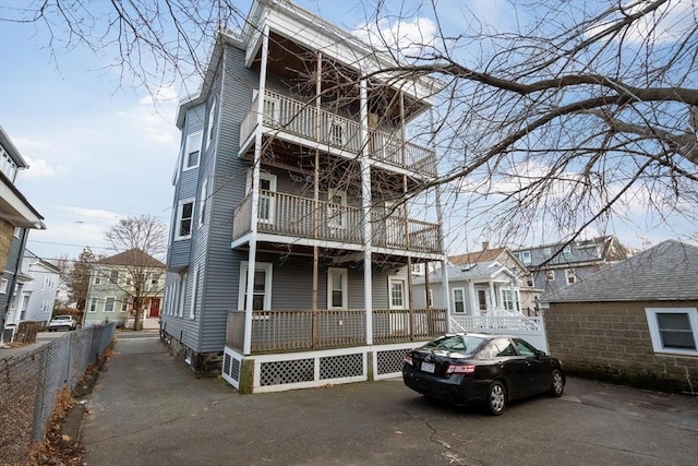 view of front of home with a balcony