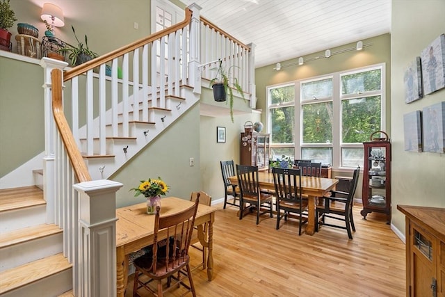 25 Brandt Beach Ave, Mattapoisett, MA 02739 - dining room featuring wood finished floors, stairway, rail lighting, and wooden ceiling
