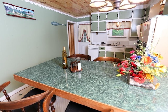 14 Cormack Rd, Sturbridge, MA 01566 - kitchen featuring white range, wooden ceiling, a sink, a breakfast bar area, and a chandelier