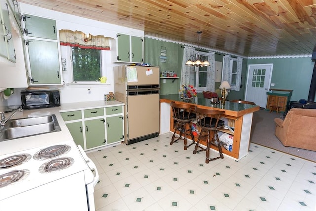 14 Cormack Rd, Sturbridge, MA 01566 - kitchen with white appliances, green cabinets, a sink, wooden ceiling, and a chandelier