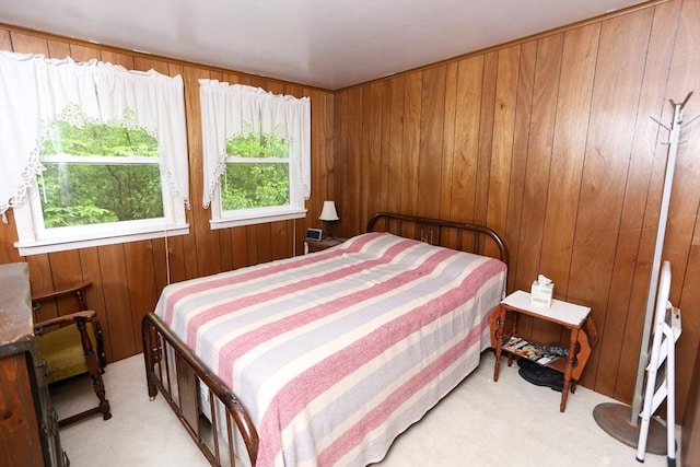 14 Cormack Rd, Sturbridge, MA 01566 - bedroom with multiple windows, light colored carpet, and wooden walls