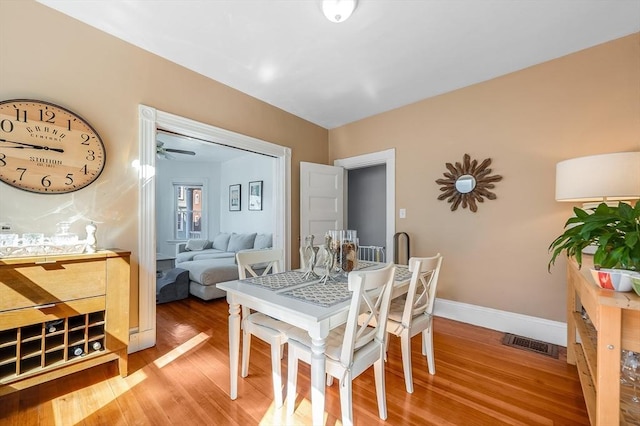 21 Sudan St, Boston, MA 02125 - dining area featuring light wood finished floors and baseboards