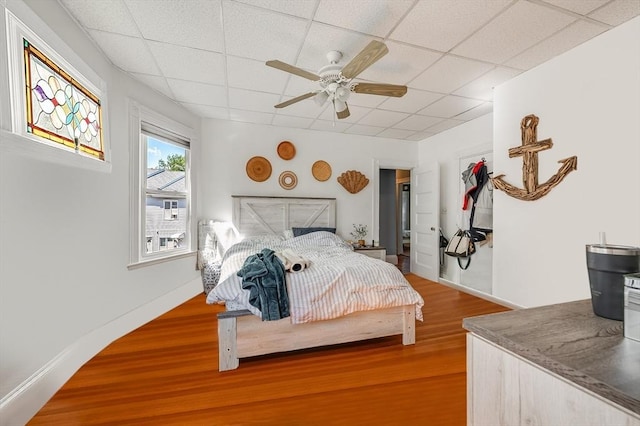 21 Sudan St, Boston, MA 02125 - bedroom with a drop ceiling, wood finished floors, and ceiling fan