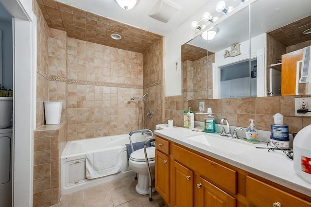 21 Sudan St, Boston, MA 02125 - full bathroom with tile walls, toilet, vanity, tile patterned floors, and shower / washtub combination