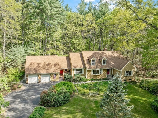 4 Clarke Rd, Littleton, MA 01460 - cape cod-style house with a garage, driveway, a view of trees, and a chimney