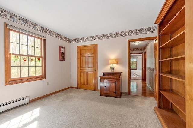 4 Clarke Rd, Littleton, MA 01460 - carpeted spare room with baseboard heating, plenty of natural light, and baseboards
