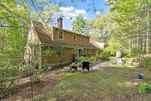4 Clarke Rd, Littleton, MA 01460 - back of house featuring a chimney