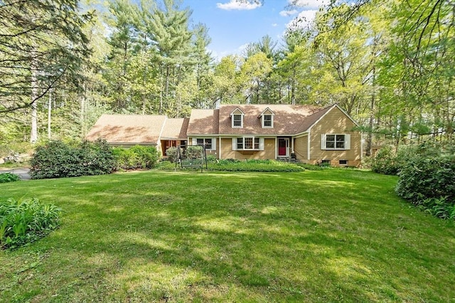 4 Clarke Rd, Littleton, MA 01460 - new england style home with a front lawn